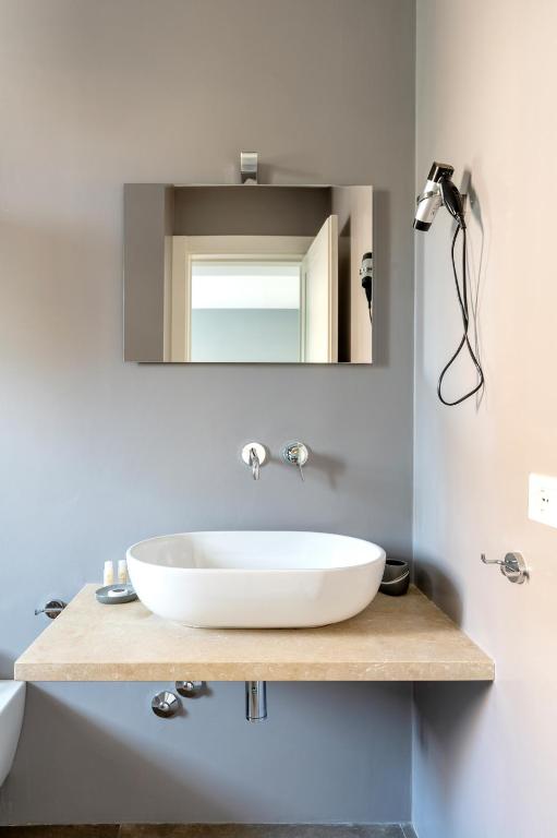 Koupelna v ubytování Serafini Rooms
