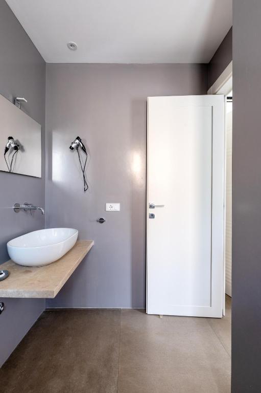 Koupelna v ubytování Serafini Rooms