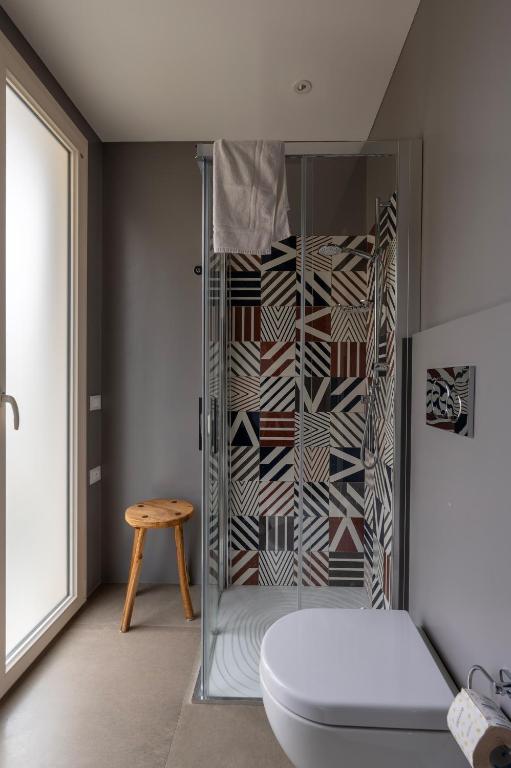 Koupelna v ubytování Serafini Rooms