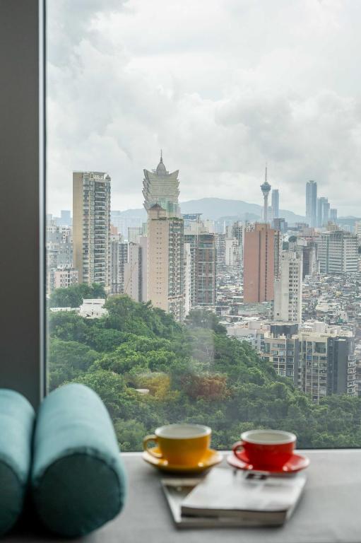 Nespecifikovaný výhled na destinaci Macao nebo výhled na město při pohledu z hotelu