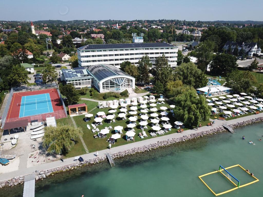 an aerial view of a resort with a pool at Hotel Marina Port in Balatonkenese