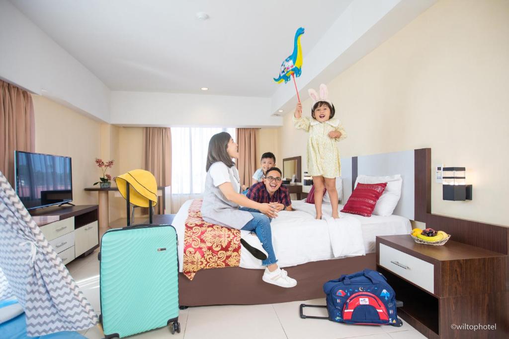 TV a/nebo společenská místnost v ubytování Wiltop Hotel Jambi