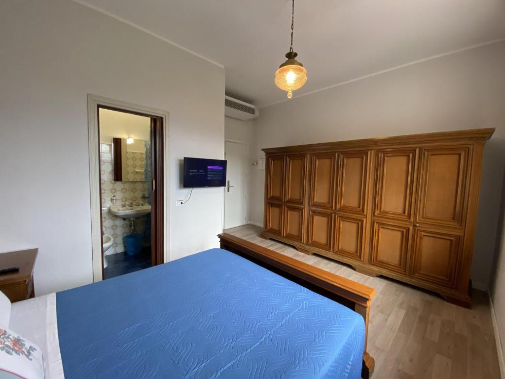 Postel nebo postele na pokoji v ubytování Albergo Lodrino