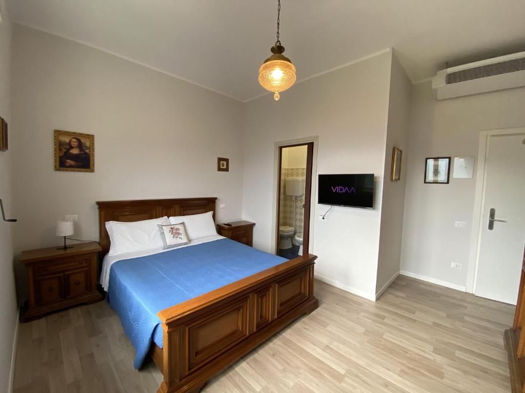 Postel nebo postele na pokoji v ubytování Albergo Lodrino