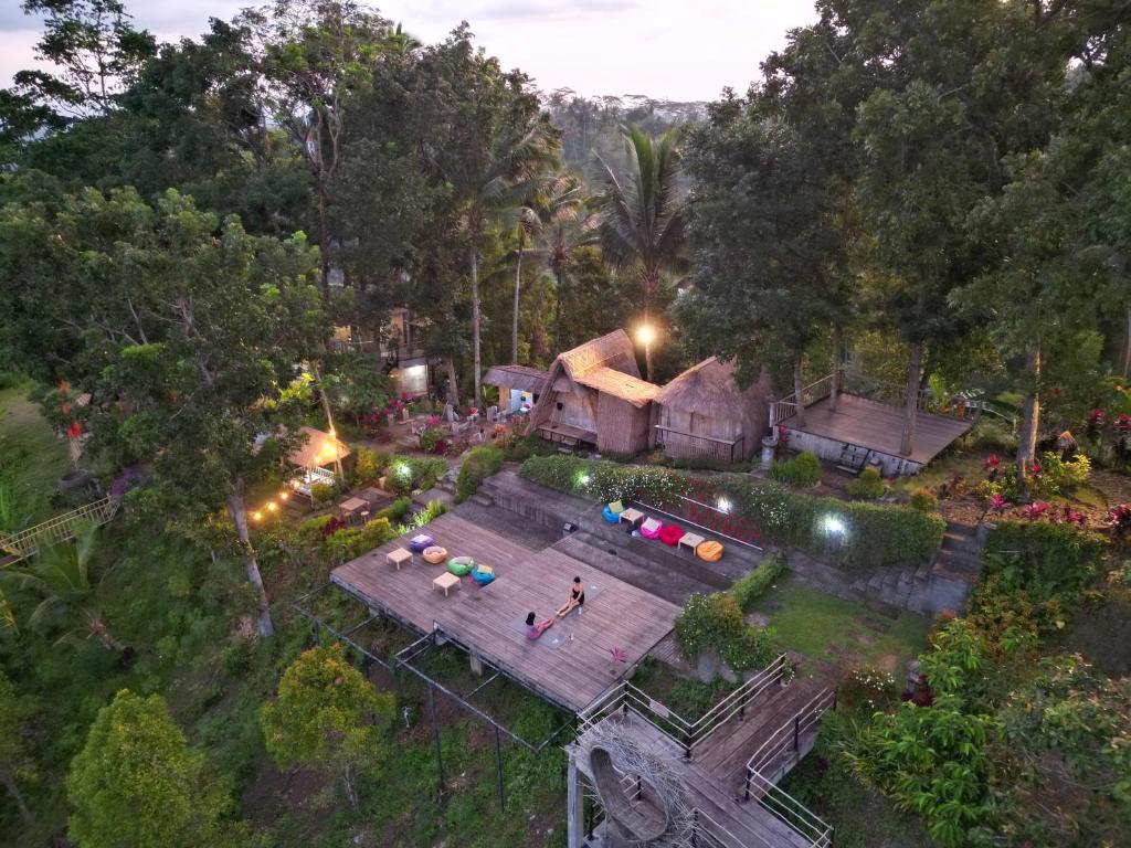 an overhead view of a house in a forest at Taman Asta Gangga by ecommerceloka in Silebeng