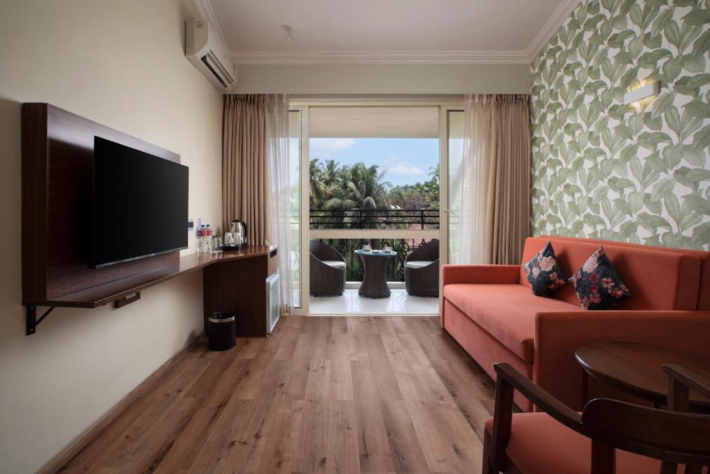 TV a/nebo společenská místnost v ubytování Clarion Hotel Ocean Palms Goa