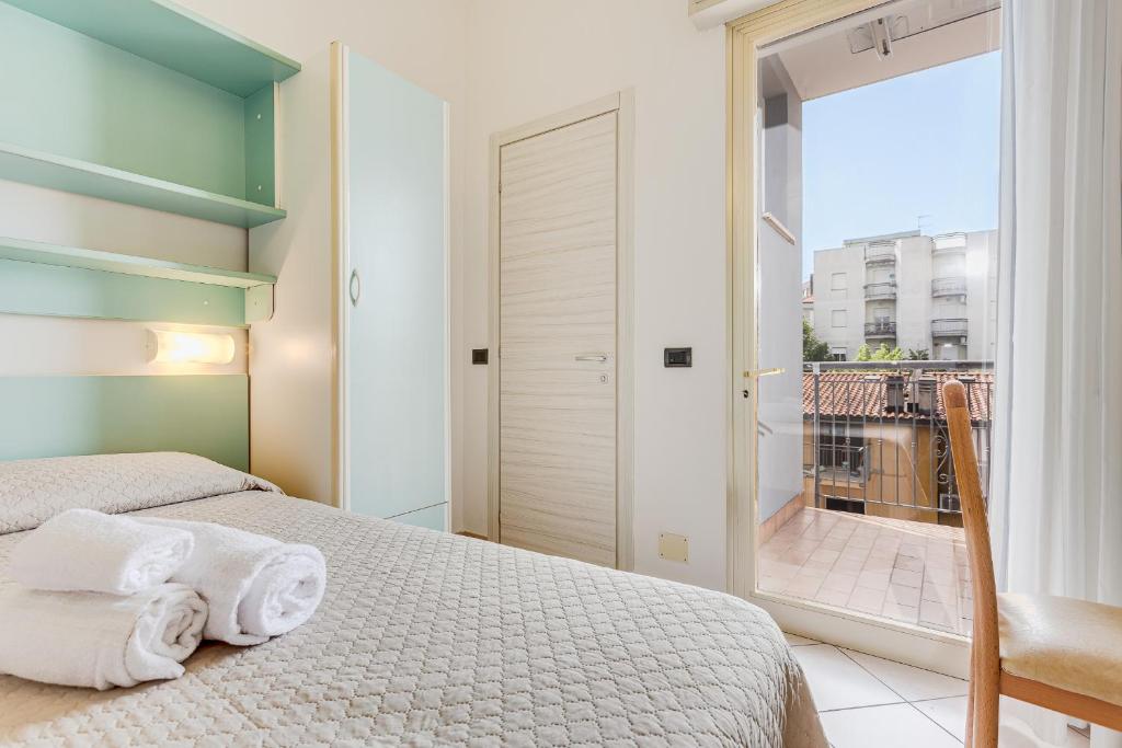 Postel nebo postele na pokoji v ubytování Hotel Costaverde