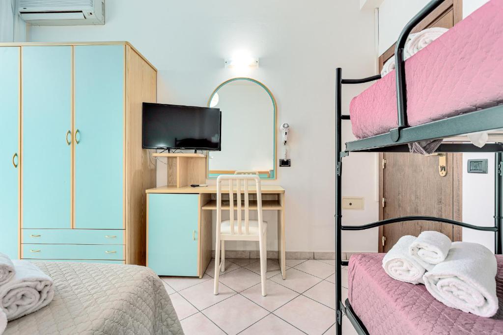 Postel nebo postele na pokoji v ubytování Hotel Costaverde