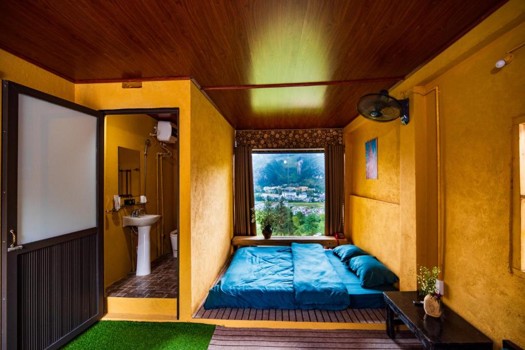Giường trong phòng chung tại Đồng Văn Panorama Homestay