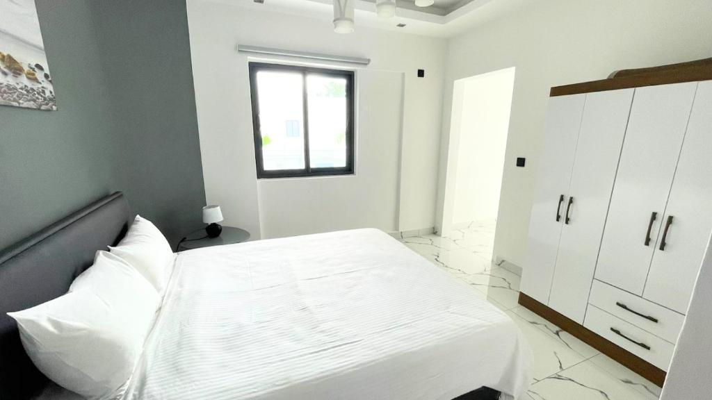 Postel nebo postele na pokoji v ubytování O'Beach Boutique Studios