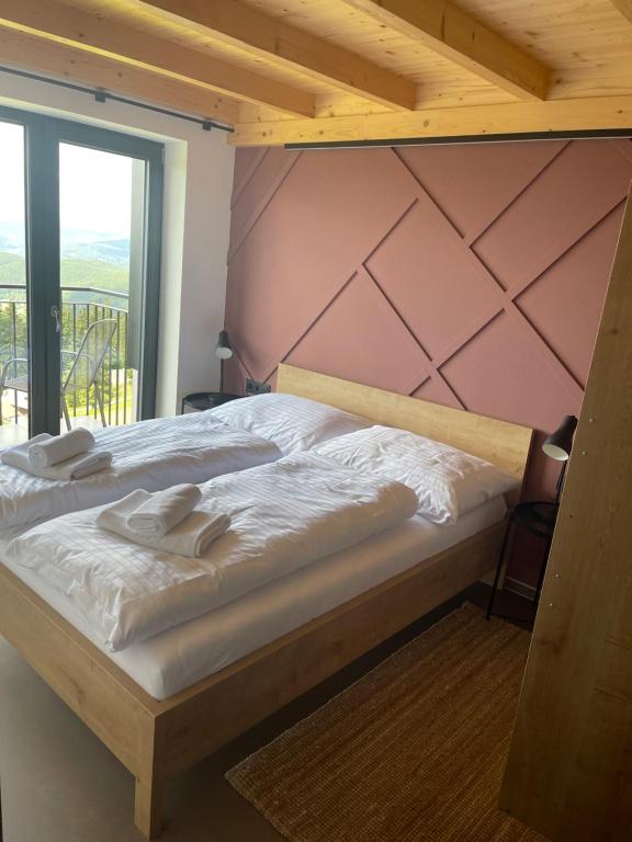 Postel nebo postele na pokoji v ubytování Resort Javorníky