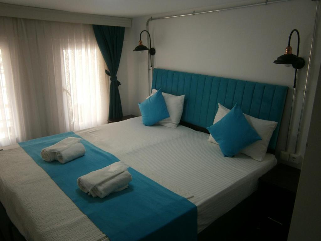 A bed or beds in a room at Nos Istanbul