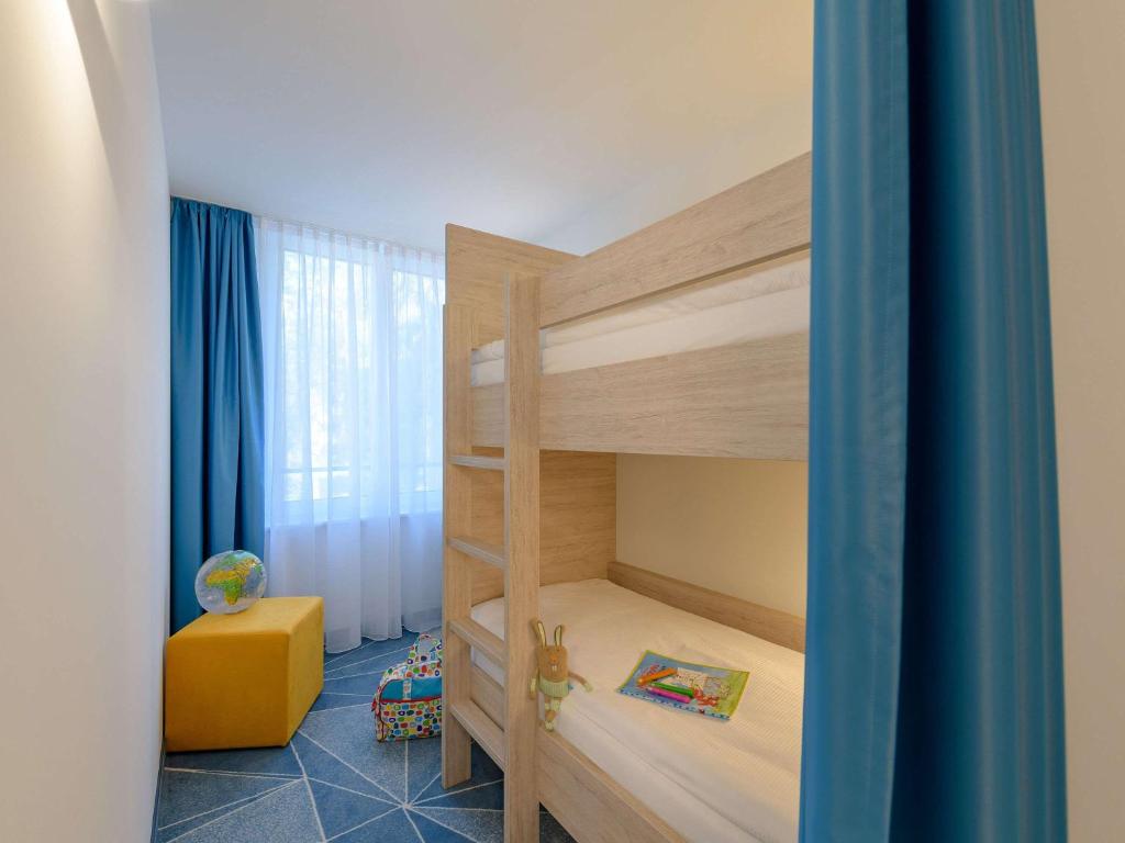 Postel nebo postele na pokoji v ubytování ibis Styles Bad Reichenhall