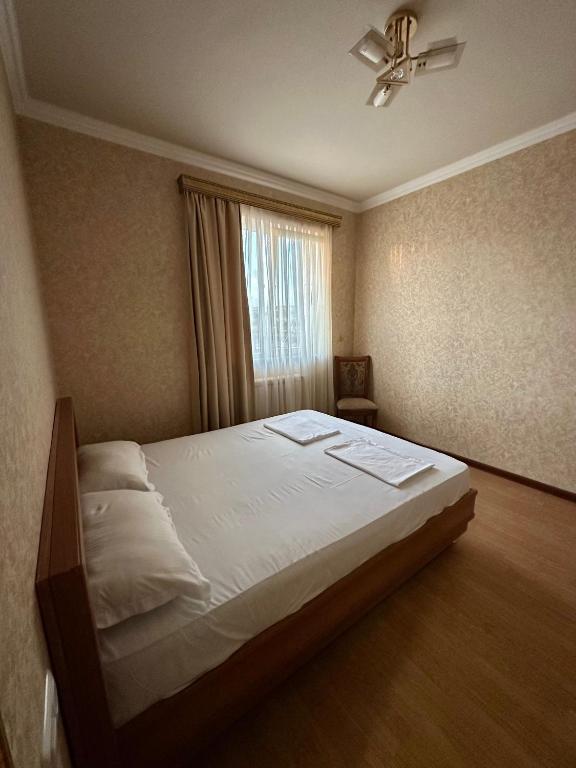 Postel nebo postele na pokoji v ubytování Giza