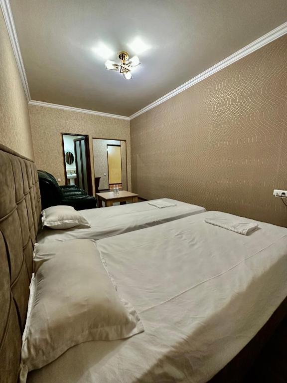 Postel nebo postele na pokoji v ubytování Giza