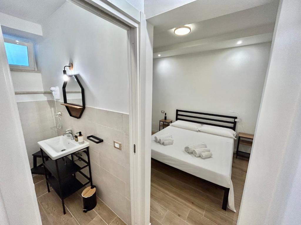 Postel nebo postele na pokoji v ubytování Sperlonga Sul Mare