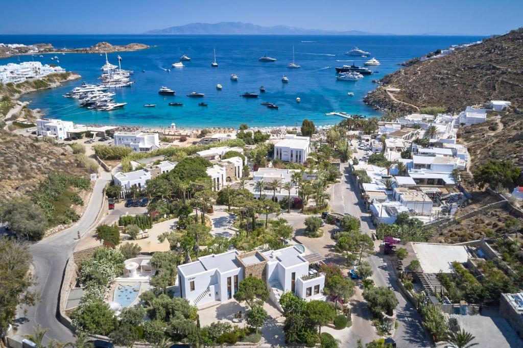 an aerial view of a resort with boats in the water at Nammos Hotel Mykonos in Psarou