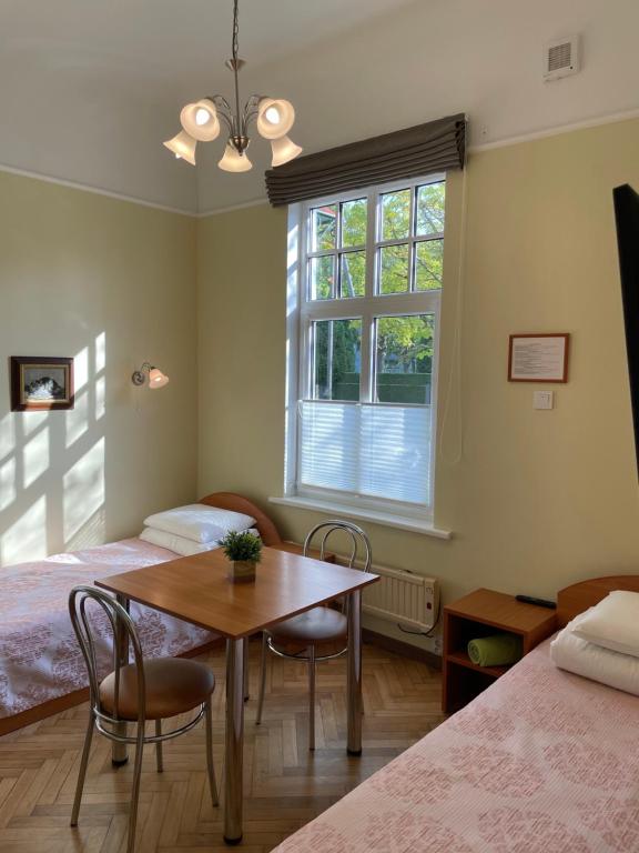 Postel nebo postele na pokoji v ubytování Green Villa