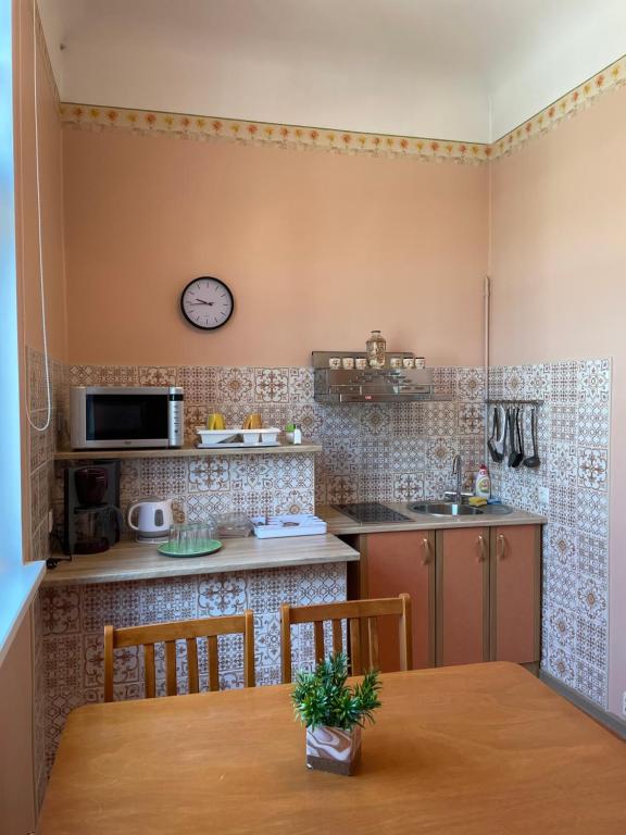 Kuchyň nebo kuchyňský kout v ubytování Green Villa
