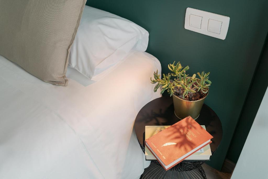 Posteľ alebo postele v izbe v ubytovaní Someso Apartamentos Turisticos