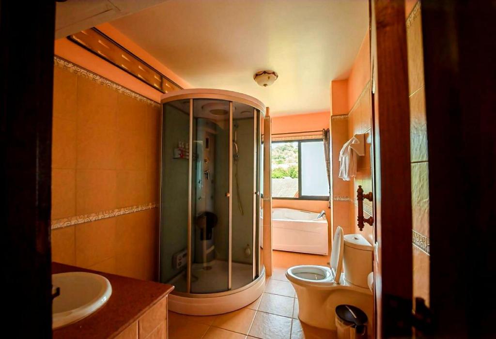 Koupelna v ubytování ดอยหมอกดอกไม้รีสอร์ท DoiMok DokMai Resort