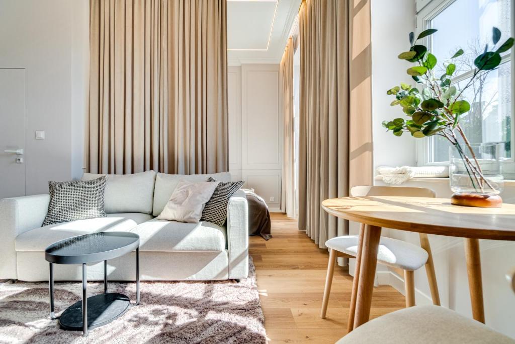 Posezení v ubytování Poniatowskiego Parkside Studio~Parking and lift