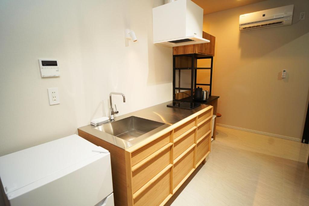Kuchyň nebo kuchyňský kout v ubytování Etcetera Guest House