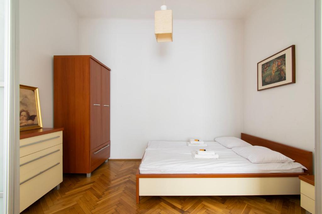 Posteľ alebo postele v izbe v ubytovaní Wondrous Apartment Warszawska street
