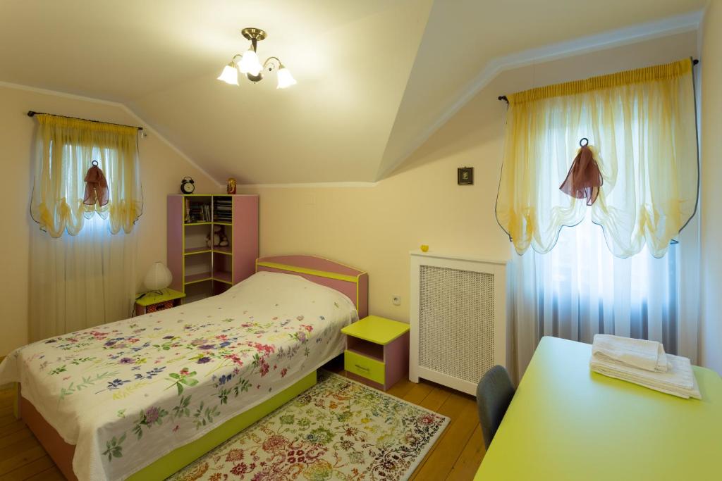 Postel nebo postele na pokoji v ubytování Casa TaMi