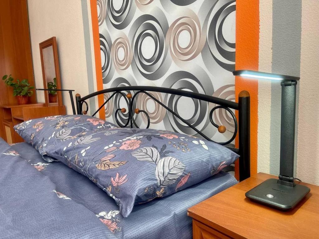 Vuode tai vuoteita majoituspaikassa Uneed Rooms Sakvoiaj