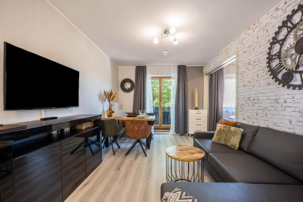 TV a/nebo společenská místnost v ubytování Time 2 Sea