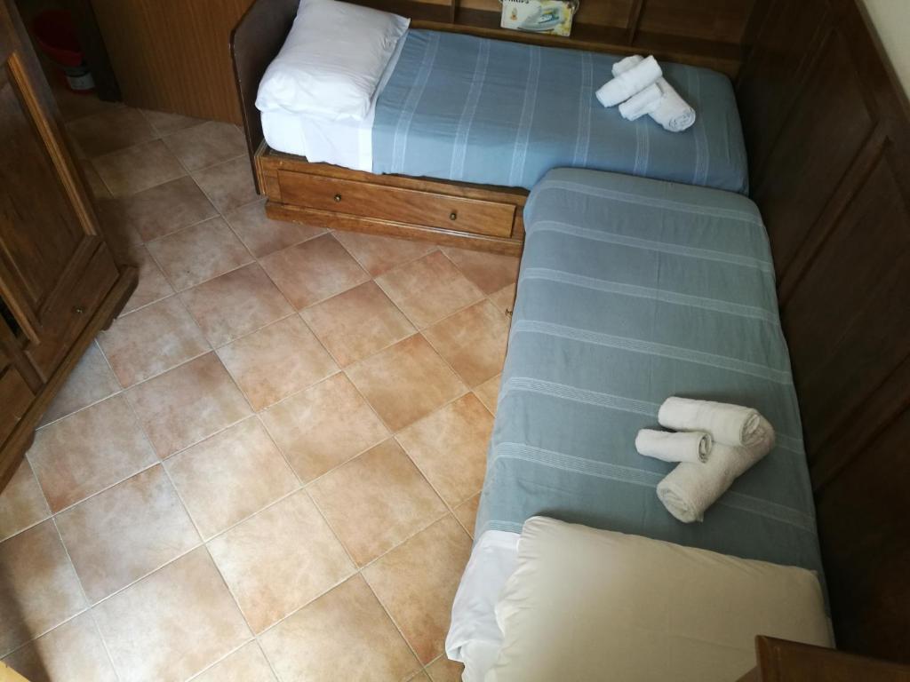 Postel nebo postele na pokoji v ubytování Casa Corone