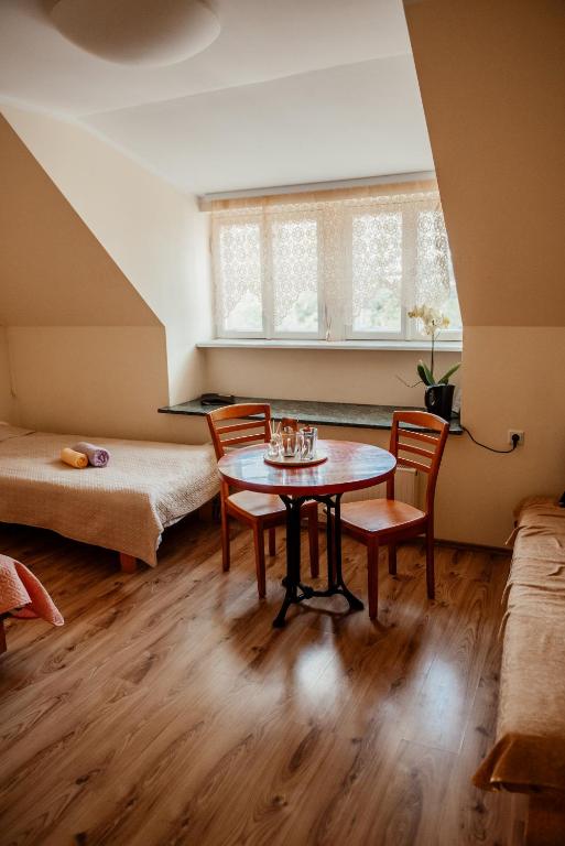 Postel nebo postele na pokoji v ubytování Edgari Guesthouse