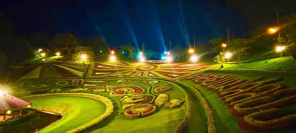 Zahrada ubytování ดอยหมอกดอกไม้รีสอร์ท DoiMok DokMai Resort