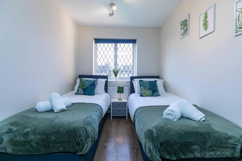 מיטה או מיטות בחדר ב-Lovely Two Bed at Tanglewood