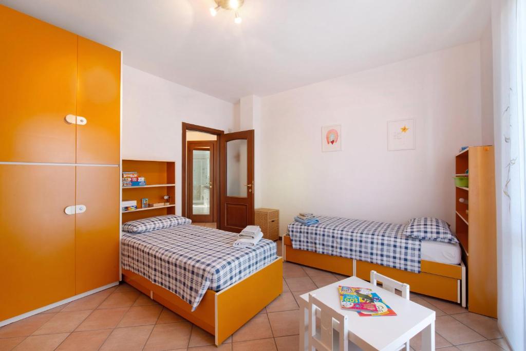 Postel nebo postele na pokoji v ubytování Casa Elli