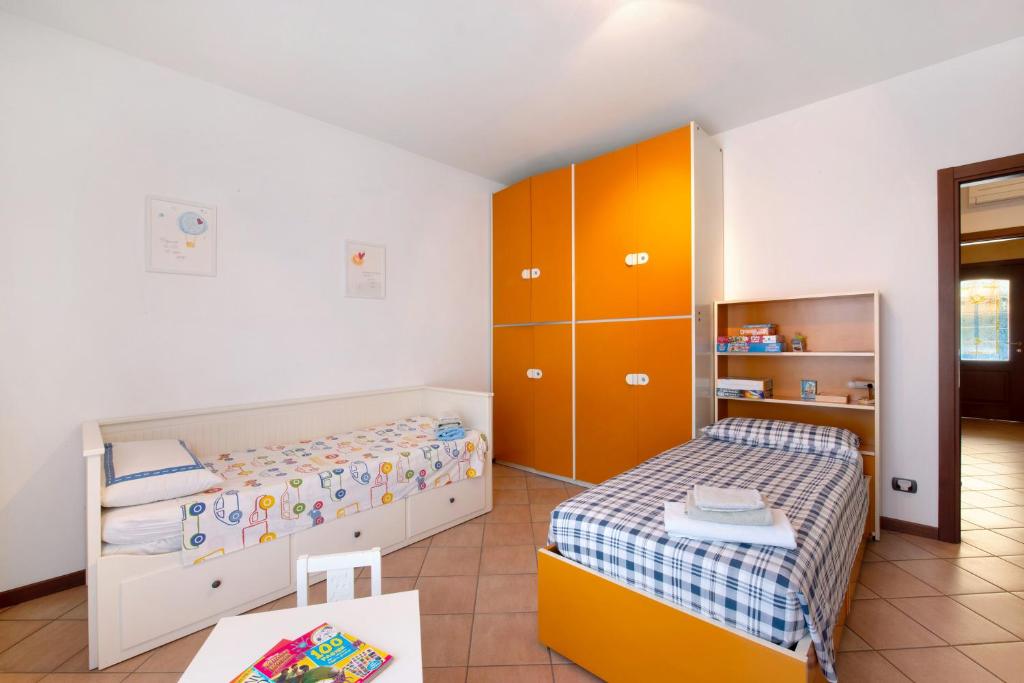 Postel nebo postele na pokoji v ubytování Casa Elli
