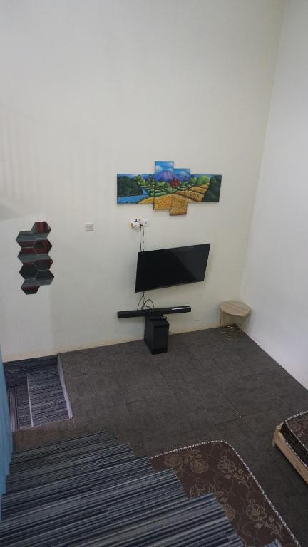 TV a/nebo společenská místnost v ubytování Le Desa Resort Syariah