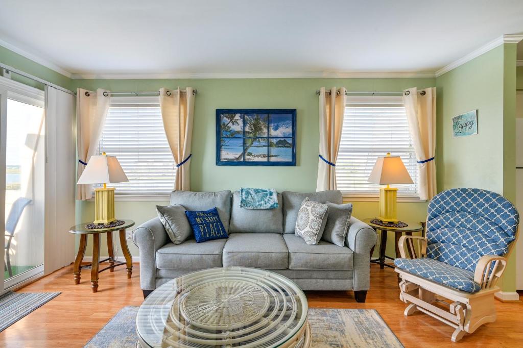 a living room with a couch and two chairs at Coastal Murrells Inlet Condo with Balcony! in Myrtle Beach
