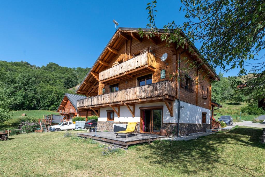 a house that is under construction in a field at Chalet le Chardon Bleu in Villarembert
