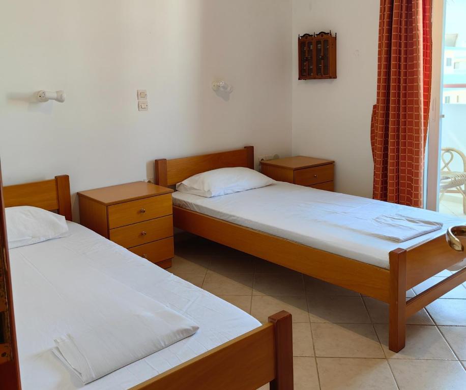 Postel nebo postele na pokoji v ubytování Irene Apartment