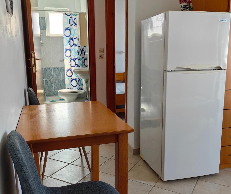 Kuchyň nebo kuchyňský kout v ubytování Irene Apartment