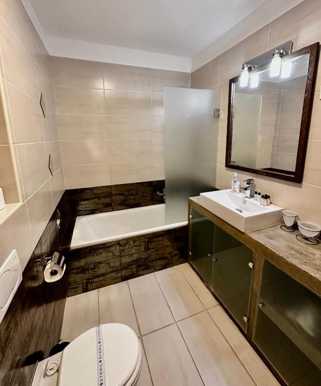 Kúpeľňa v ubytovaní Leda Apartments