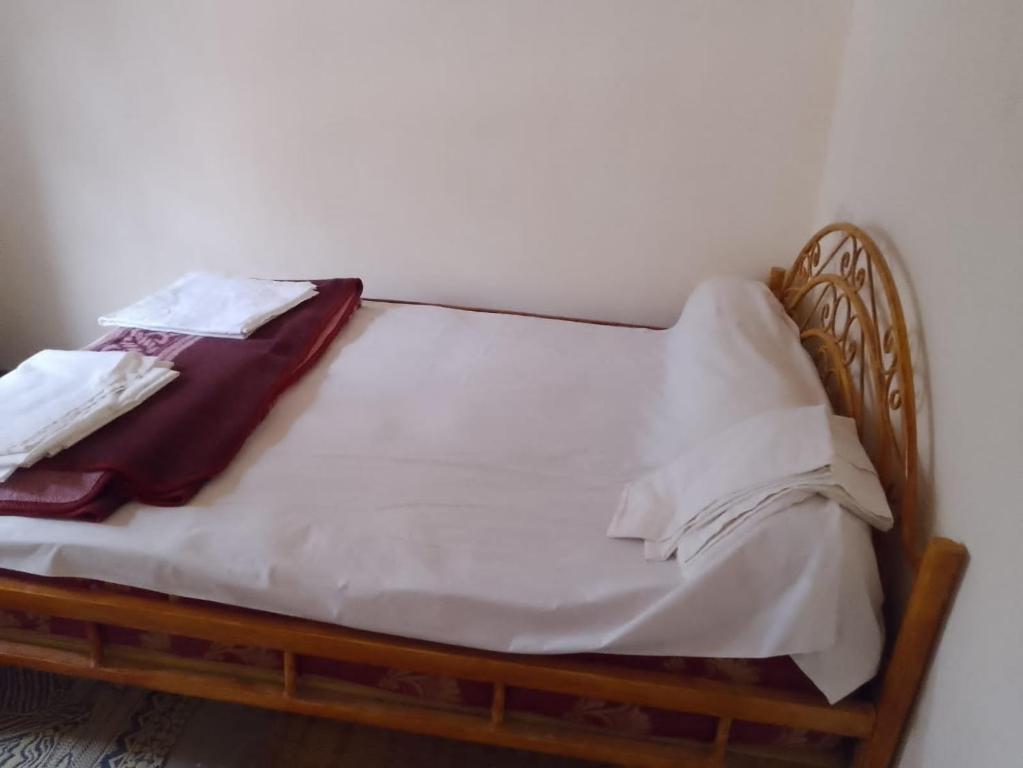 Postel nebo postele na pokoji v ubytování HÔTEL AUBERGE ETOILE DADES