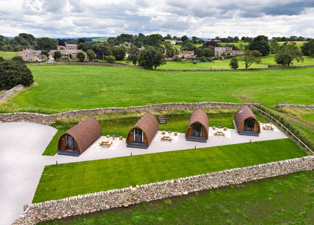 an overhead view of a group of tents in a field at Malhamdale Glamping in Skipton
