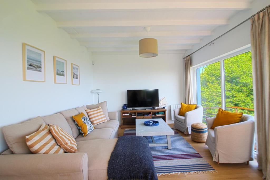 TV a/nebo společenská místnost v ubytování Marina House