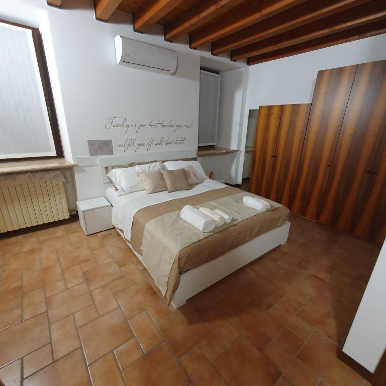 Postel nebo postele na pokoji v ubytování GESUITIROOMS