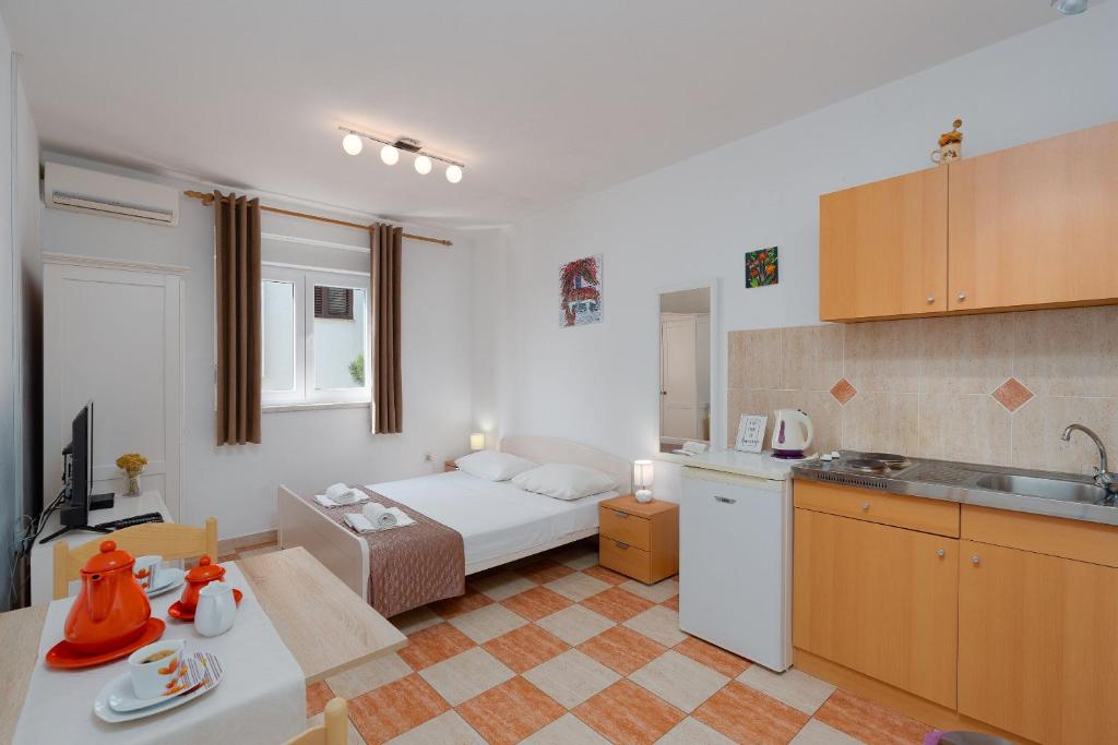 Kuchyň nebo kuchyňský kout v ubytování Apartments Family Gligora
