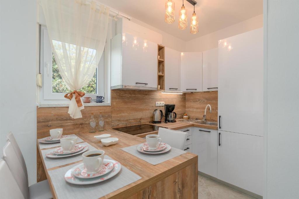 Kuchyň nebo kuchyňský kout v ubytování Apartments Family Gligora