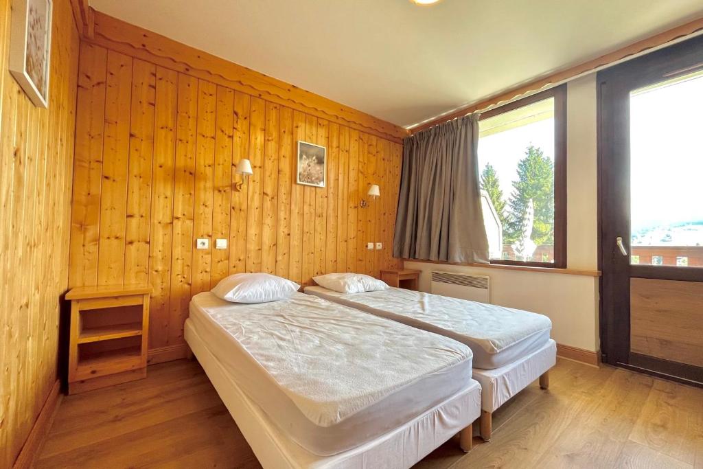 Posteľ alebo postele v izbe v ubytovaní Cosy Chalet with Terrace